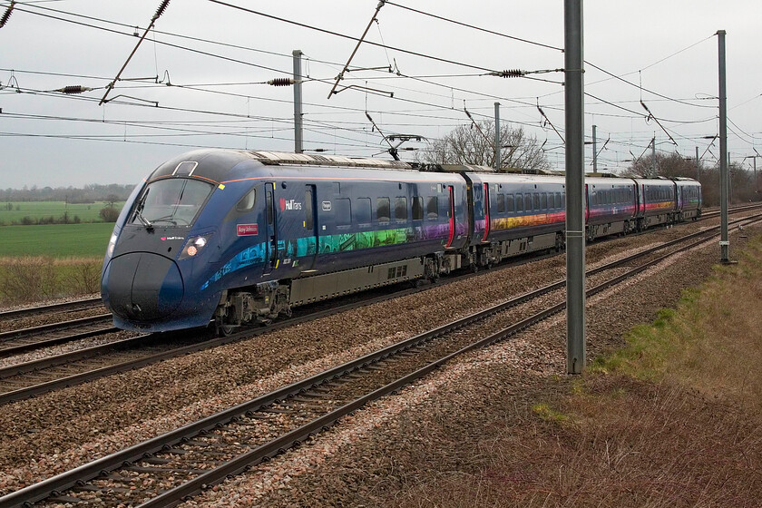 802301, HT 05.57 Beverley-London King's Cross (1A91, 2E), Sandy TL176510 
 Looking very smart in its Hull Trains livery 802301 Amy Johnson approaches Sandy at New Zealand bridge working the 1A91 05.57 Beverley to Kings Cross service. With other operators affected by industrial action on this Saturday morning, this service was heavily loaded or so it seemed from what I saw through the windows as it swept past me! 
 Keywords: 802301 05.57 Beverley-London King's Cross 1A91 Sandy TL176510 Hull Trains