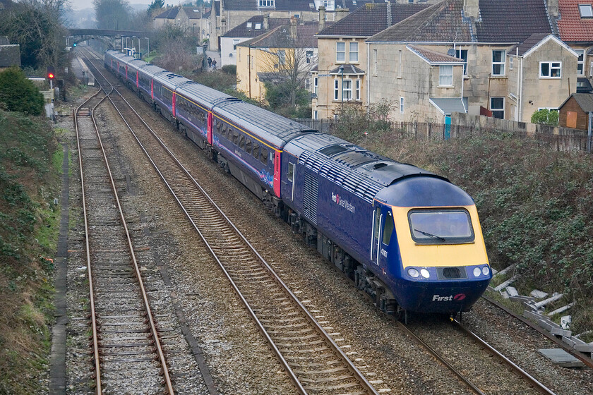 43161, GW 09.30 Bristol Temple Meads-London Paddington, Oldfield Park, Brougham Heyes Bridge 
 First Great Western's 09.30 Bristol to Paddington HST service passes the suburbs of Bath passing through Oldfield Park station led by power car 43161. The siding to the left led to a watse transfer terminal where the binliner trains to Calvert were loaded, a flow that no longer runs. 
 Keywords: 43161 09.30 Bristol Temple Meads-London Paddington Oldfield Park Brougham Heyes Bridge FGW First Great Western