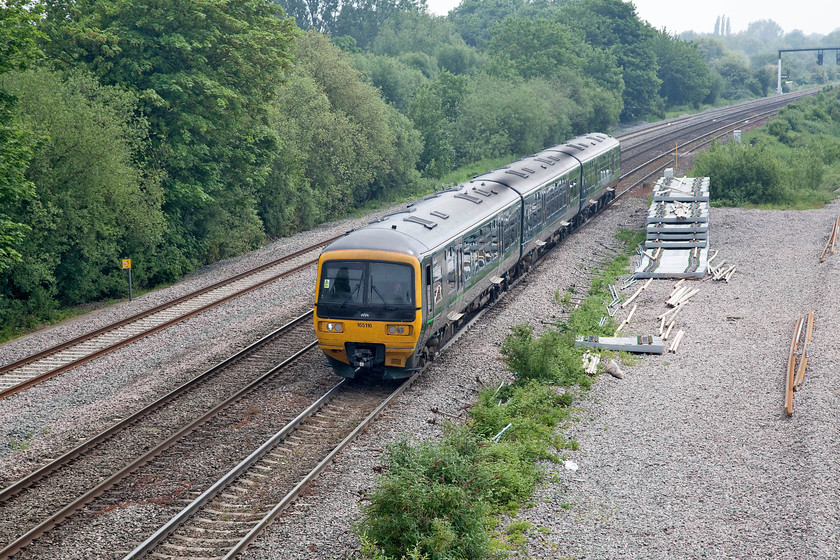 165116, GW 11.18 London Paddington-Evesham (1W29, 19L), Godstow Bridge 
 165116 passes Godstow Bridge forming the 11.18 London Paddington to Evesham. All trains on the Cotswold Line were starting from and terminating at Evesham due to engineering works over the bank holiday weekend. Notice the fresh ballast and stack of track panels associated with the relaying of the relief line north of Oxford. Unfortunately, some years after the process was started, it has yet to be finished and commissioned. 
 Keywords: 165116 1W29 Godstow Bridge