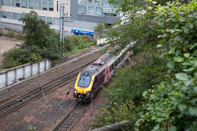 220026, XC 09.08 Edinburgh-Waverley-Penzance (1V56), Jacob`s Ladder 
 220026, seen a little earlier in Waverley station, passes through the throat of the station working the 09.08 to Penzance. It is seen from Jacob's Ladder steps that is cut into the granite rock of Calton Mount. 
 Keywords: 220026 09.08 Edinburgh-Waverley-Penzance 1V56 Jacob`s Ladder