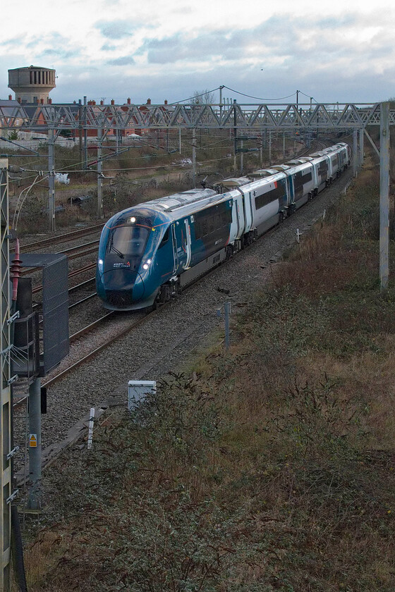 807001, VT 14.16 London Euston-Birmingham New Street (9G26, 1L), site of Roade station 
 With the timetable change having taken place last Sunday (15.12.24) the universally disliked Voyagers have finally been ousted from the WCML with the Avero takeover complete. 807001 passes Roade working the 14.16 Euston to Birmingham New Street service. 
 Keywords: 807001 14.16 London Euston-Birmingham New Street 9G26 site of Roade station AWC Avanti West Coast Avero