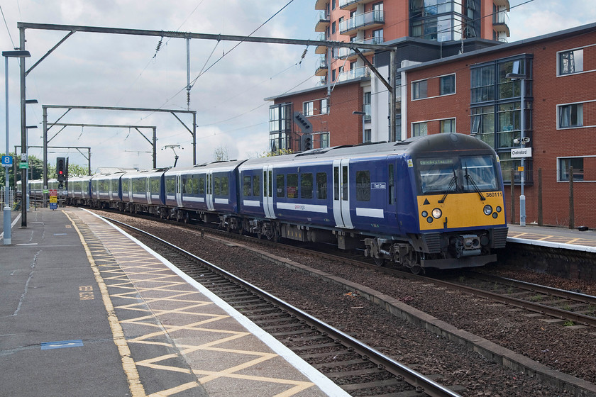 360111, LE 13.58 London Liverpool Street-Colchester Town (2F54, 1E), Chelmsford station 
 I find these class 360s a particularly ugly design! Here, 360111 arrives at Chelmsford station forming the 2F54 Liverpool Street to Colchester Town. Andy and I were being watched by two security operatives as we took this picture. They had earlier challenged me about the taking of pictures on the station being not allowed, as usual, I challenged them on this advising them to check policies and protocols relating to station photography, they were little taken aback seeking then to radio their control. 
 Keywords: 360111 2F54 Chelmsford station