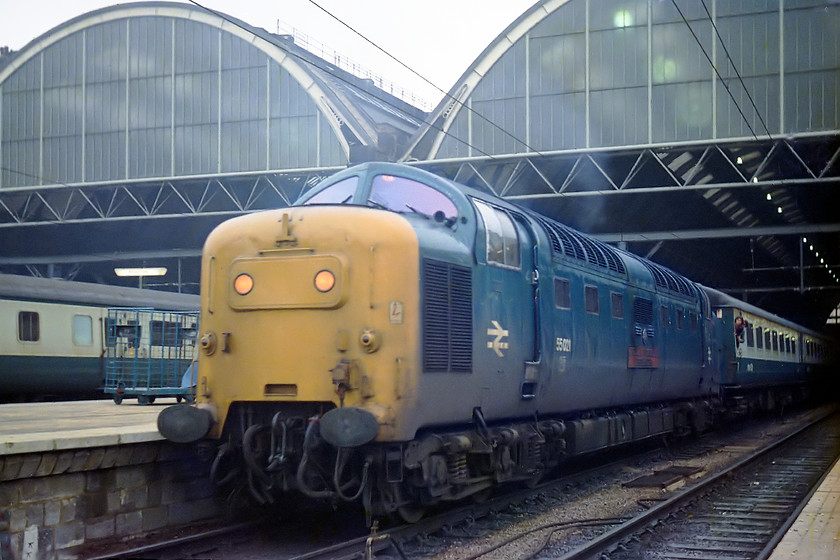 55021, 1000 London Kings Cross-Edinburgh The Flying Scotsman (1S17), London Kings Cross station 
 One of my trademark low angle shots that I seem to remember I took to emphasise speed and poise! Here it has worked well by showing off two of king's Cross' train shed arches towering above 55021 'Argyll and Sutherland Highlander' waiting to leave at the head of the 1S17 'Flying Scotsman', the 10.00 to Edinburgh. This was only the second day of service for 55021 after being released from Doncaster Works having had an engine and bogie change completed. 
 Keywords: 55021 1000 London Kings Cross-Edinburgh The Flying Scotsman 1S17 London Kings Cross station