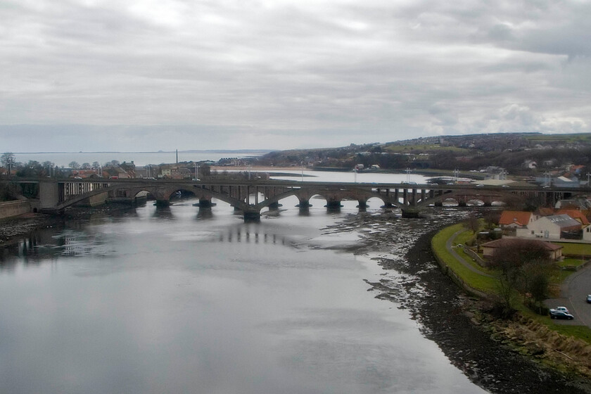 Crossing the Royal Border bridge, Berwick-Upon-Tweed 
 Another of my trademark 'crossing a bridge' photographs! This time, the 09.00 King's Cross to Edinburgh service crosses the Royal Border bridge with the estuary of the River Tweed passing out to the North Sea in the background. The A1197 road bridge is seen with the much older and historic Berwick Bridge behind it. The actual boundary between Scotland and England is still some ten miles north of this spot despite the name given to the bridge. 
 Keywords: Crossing the Royal Border bridge Berwick-Upon-Tweed