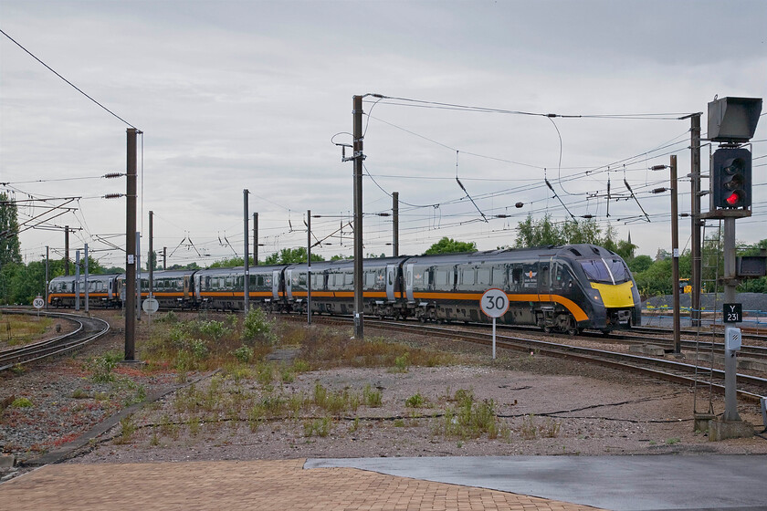 180105, GC 15.18 Sunderland-London King's Cross (1A66), York station 
 The track layout at the northern section of York station has been drastically rationalised in recent years and now basically consists of four bi-directional tracks in marked contrast to the 1980 view as seen at..... https://www.ontheupfast.com/p/21936chg/29831160204/x31308-up-engineers-train-york-station In this view, Grand Central's 180105 approaches the station working the 15.18 Sunderland to King's Cross 1A66 service. 
 Keywords: 180105 15.18 Sunderland-London King's Cross 1A66 York station Grand central