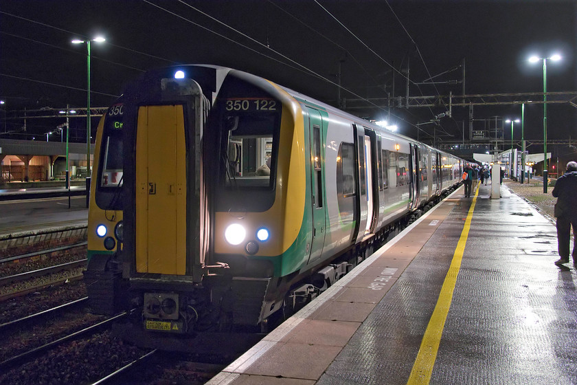 350122, LN 19.15 London Euston-Crewe & Walsall (1Y27 & 2A05, 5L), Northampton station 
 350122 leads another unit at Northampton station having arrived with the 19.15 Euston to Crewe and Walsall. Having enjoyed some dinner in London, Andy, Mike and I had returned to Northampton on this train bringing to an end a very interesting day exploring north London. 
 Keywords: 350122 19.15 London Euston-Crewe Walsall 1Y27 2A05 Northampton station London Northwestern Desiro