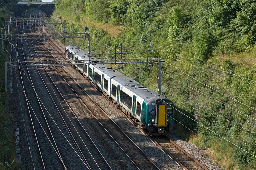 350244, LN 16.30 Northampton EMD-Bletchley CS (5B01, 5L), Hyde Road bridge 
 With the imminent introduction of the new five-car Class 730/2s the Class 350/2s will soon be going off-lease and face an uncertain future. However, recently, there has been unconfirmed talk that their owner, Porterbrook, may be considering converting them to battery operation. One that may go that way is 350244 seen here passing through Roade cutting as the 5B01 16.30 Northampton EMD (Siemens) to Betchley Carriage Sidings ECS move. 
 Keywords: 350244 16.30 Northampton EMD-Bletchley CS 5B01 Hyde Road bridge ECS Empty coaching stock