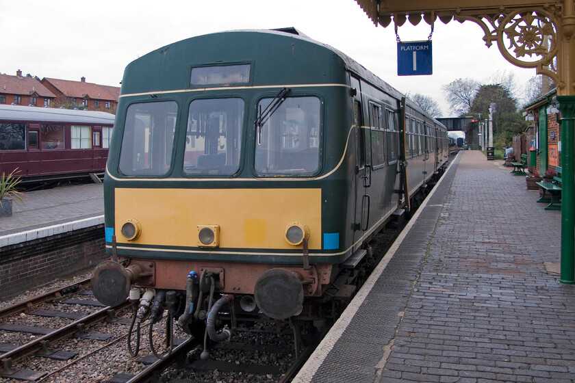 M51352 & M56192, 15.45 Sheringham-Holt, Sheringham station 
 The 15.45 Sheringham to Holt DMU service waits at Sheringham station, this is the last outward train of the day on the North Norfolk Railway. I was to travel on this service back to Weybourne in order to collect the car and drive back to pick my wife and son up. With the ticket office now closed I went to buy a ticket on the train but the conductor waved this hoping that I had had a nice day - how refreshing! 
 Keywords: M51352 M56192 15.45 Sheringham-Holt Sheringham station Class 101 First Generation DMU