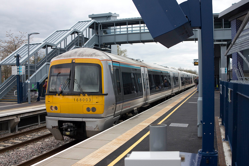 168003, 14.17 Oxford Parkway-London Marylebone (1Y35), Bicester Village station 
 The 1Y35 Chiltern 14.17 Oxford to Marylebone arrives at Bicester Village station formed of 168003. This was my first visit to the newly completed station at Bicester. Quite a transformation from the tiny single platform affair with just a waiting shelter that it replaced as part of the multi-million pound rebuilding of the line between Oxford and the Chiltern mainline. This is supposed to be the first phase of the reinstatement of the entire Varsity Line linking Oxford with Cambridge.....I won't hold my breath! 
 Keywords: 168003 14.17 Oxford Parkway-London Marylebone 1Y35 Bicester Village station