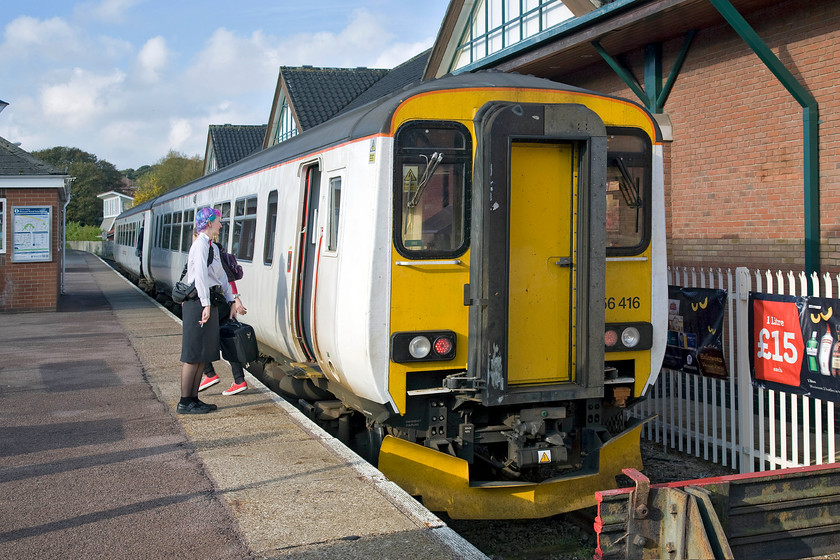 156416, LE 09.44 Sheringham-Norwich (2S09), Cromer station 
 The guard (or train manager in modern parlance!) supervises the reversal of direction of 156416 at Cromer station. Having travelled in from Sheringham on the 09.44 to Norwich we will soon leave whence the direction that we arrived before diverging to the south at Cromer Junction. I can't help but feel that the Greater Anglia paint scheme is a little plain looking almost as if it's an unbranded neutral livery? 
 Keywords: 156416 09.44 Sheringham-Norwich 2S09 Cromer station GA Greater Anglia Sprinter