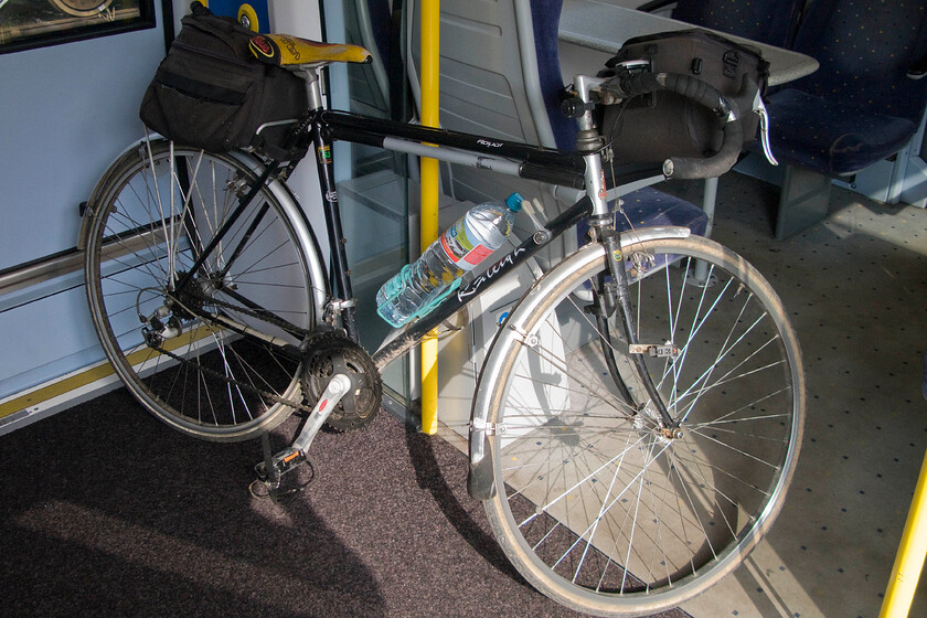 My bike on-board 350116, Northampton station 
 My bike on-board 350116 as we wait to depart from Northampton station to Rugby. Unless one has a folding bike, the carrying of bikes on modern trains is always seen as a bit of an issue with no proper provision made for them and strict limits on the numbers permitted. If the railways are to be a part of the new 'green deal' of fully intergrated public transportation then this really must change but do any TOCs have the drive to do this? 
 Keywords: My bike on-board 350116 Northampton station