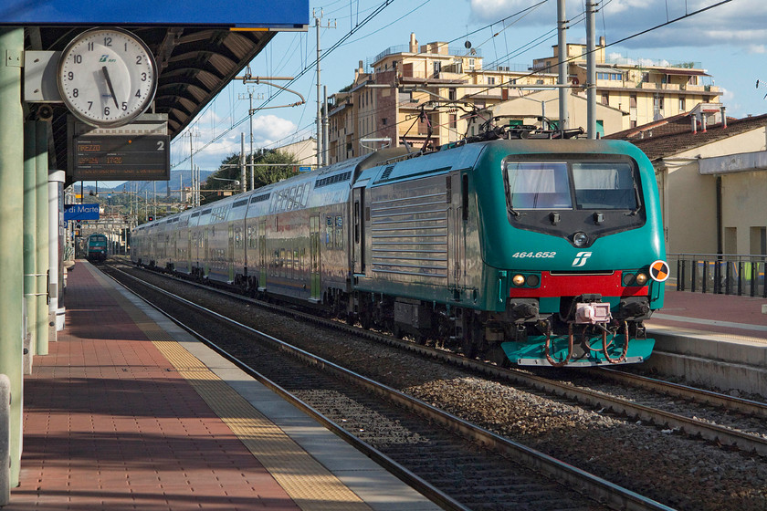 464.652, 17.08 Arezzo-Florence SMN (23518), Florence CM station 
 464.652 leads train 23518 through Florence Campo di Marte (CM) station. This is the 17.08 Arezzo to Florence SMN that is just one station away now. This is one of the modified class 464s that can work with the new double-decker coaching stock. 
 Keywords: 464.65200 17.08 Arezzo-Florence SMN 23518 Florence CM station