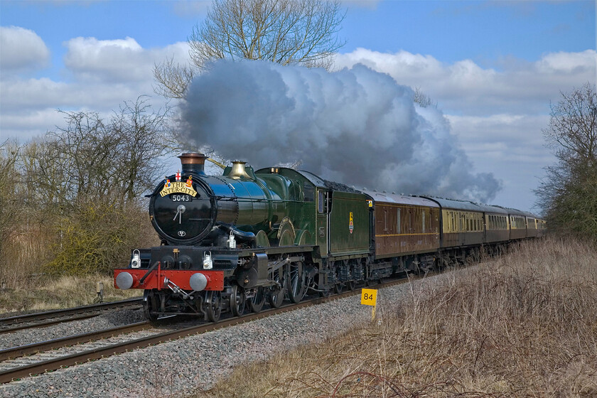 5043, outward leg of The Marylebone Flyer, 07.57 Birmingham Moor Street-London Marylebone (1Z44), King's Sutton SP486377 
 Looking very smart in some cold April sunshine Castle Class 4-6-0 5043 'Earl of Mount Edgcumbe' storms southwards between Banbury and King's Sutton leading the 1Z44 07.57 Birmingham Moor Street to Marylebone charter. It led The Marylebone Flyer all the way to London with 47245 on the rear. This charter was a re-run of the original that was to have run on 13.10.12 but was cancelled due to a failed water carrier. I am glad that I decided to venture out in the morning to capture the outward charter as the return was piloted by 47245 due to a high lineside fire risk. 
 Keywords: 5043 The Marylebone Flyer 07.57 Birmingham Moor Street-London Marylebone 1Z44 King's Sutton SP486377 Earl of Mount Edgcumbe