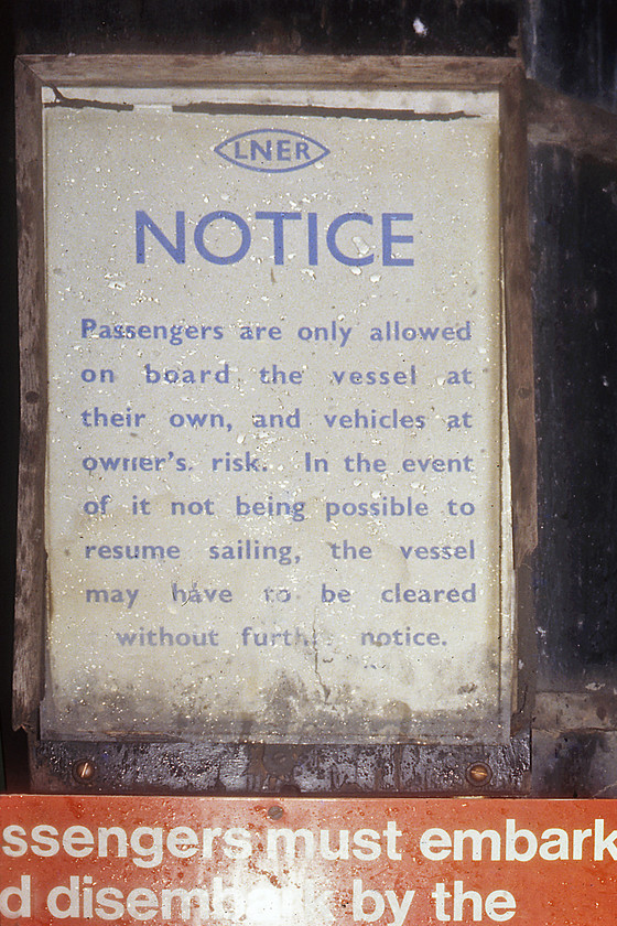 LNER paper notice, New Holland Pier 
 A remarkable survivor on New Holland Pier station. An ex LNER paper notice with its modern corporate image version below is seen behind a protective glass screen in a frame that must have been very weather tight given its harsh surroundings! As the LNER ceased to be in 1947 the very youngest this paper notice could be was thirty-three years old when this picture was taken in 1980. 
 Keywords: LNER paper notice New Holland Pier station