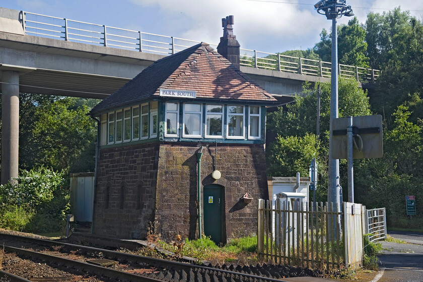 Park South signal box (Furness, 1883) 
 The superb Park South Junction signal box is seen catching some morning light. The Furness box dates from 1883 and contains the frame that was taken from Coniston Station box in 1963. 
 Keywords: Park South signal box Furness 1883