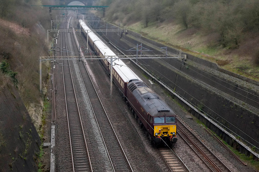 57316, 06.47 London Euston-Liverpool Lime Street (1Z59), Roade Cutting 
 57316 (formally 47290) heads up the rear of the 06.47 Euston to Liverpool Lime Street Northern Belle conveying race-goers for the Aintree Grand National. It is seen here passing through Roade Cutting on the down slow Northampton loop line. 
 Keywords: 57316 06.47 London Euston-Liverpool Lime Street 1Z59 Roade Cutting