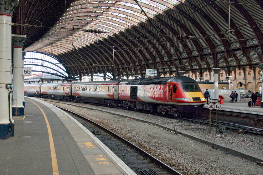 43311, VT 08.30 Edinburgh Waverley-London King`s Cross (1E07, 5L), York station 
 This is the fourth HST that was seen at York within an hour, the Azuma 'take-over' appears not to have taken place just yet! 43311 leads the 08.30 Edingburgh to King's Cross into York's platform four. This power car has been operating on the ECML since its introduction exactly forty year's ago. Back in 1979, it carried the power car number 43111 and was part of set 254028. 
 Keywords: 43311 08.30 Edinburgh Waverley-London King`s Cross 1E07 York station high speed train HST