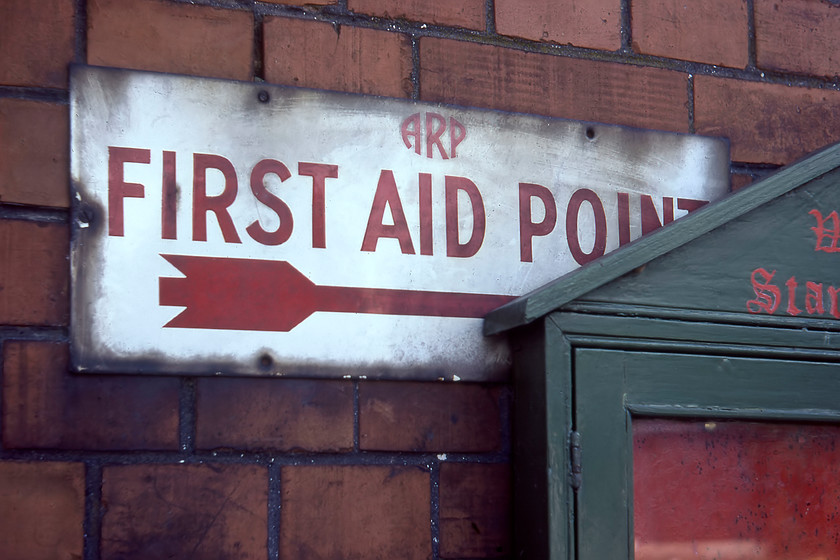 Wartime ARP enamel, Starcross 
 Whilst not railway associated I have included this photograph in the archive due to its interest. It shows a wartime ARP enamel sign at Starcross on the side of a building. Rather than remove or re-locate it the wooden notice board box has simply been placed over part of the sign! 
 Keywords: Wartime ARP enamel Starcross