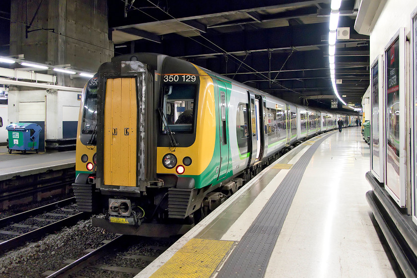 350129, LN 22.31 London Euston-Northampton (2N77, 1E), London Euston station 
 350129 waits at London Euston with our train home, the 22.31 to Northampton. We left the concert at The Roundhouse a little early just as the finale was beginning in order to get this train. If we had waited until the end, we would have had to get the last train to Northampton getting back at a very anti-social 00.50! 
 Keywords: 350129 22.31 London Euston-Northampton 2N77 London Euston station