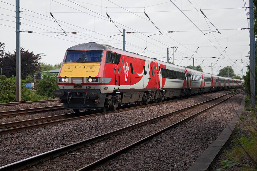 82207 & 91111, GR 06.30 Newcastle-London Kings Cross (1Y11, 2L), Gills Crossing 
 DVT 82207 leads with 91111 'For the Fallen' pushing at the rear of the 06.30 Newcastle to London King's Cross. The train is catching a little morning brightness as it passes Offord Cluny between Huntingdon and St. Neots. 
 Keywords: 82207 91111 1Y11 Gills Crossing