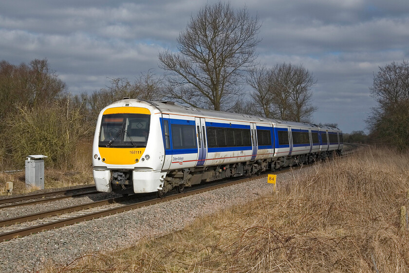 168111, CH 09.20 Stratford-on-Avon-London Marylebone, King's Sutton SP486377 
 Catching some welcome Easter sunshine Chiltern's 168111 approaches King's Sutton working the 09.20 Stratford-on-Avon to Marylebone service. Looking at the rear of the train in shadow it is one of those times when the photographic god was on my side for a change! 
 Keywords: 168111 09.20 Stratford-on-Avon-London Marylebone King's Sutton SP486377 Chiltern Turbo