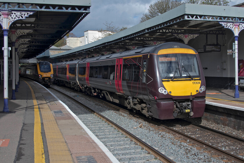 220008, XC 15.35 Bristol Temple Meads-Edinburgh Waverley (1S53, 3E) & 170106, XC 14.07 Nottingham-Cardiff Central (1V11, 2L), Cheltenham station 
 As 220008 leaves Cheltenham Spa working the 15.35 Bristol to Edinburgh 170106 arrives with the 1V11 14.07 Nottingham to Cardiff service. If I am honest, out of the two offerings from CrossCountry in this scene I would rather travel on the Class 170 rather than the Voyager such is my dislike of the latter! However, if I was travelling for any distance I would hope that the WiFi was working properly, that on the 170s can be a little glitchy in my experience! 
 Keywords: 220008 15.35 Bristol Temple Meads-Edinburgh Waverley 1S53 170106 14.07 Nottingham-Cardiff Central 1V11 Cheltenham station CrossCountry Voyager XC