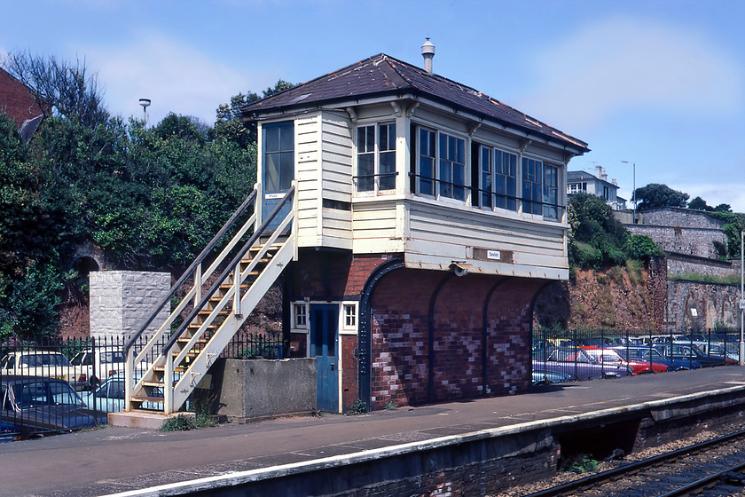 Dawlish signal box (GWR, 1918) 
 On summer Saturdays and other busy times, Dawlish signal box was manned, but at other times, it was switched out. This led to a very long block section along the entire South Devon Coast from Dawlish Warren to Teignmouth. The unusually designed box with its narrow base was to give room for passengers and their luggage on the up platform of the station. The bow, opened by the GWR in 1918, must have been a smashing place to do a shift on a balmy day like this one, but on a stormy night in February with the sea spray blowing over the box it must have been a somewhat different experience! After closure came in September 1986 the box was boarded up and the access steps removed. There were many attempts to find a use for the unique structure but none found so it was eventually demolished over a weekend in July 2013. 
 Keywords: Dawlish signal box GWR 1918