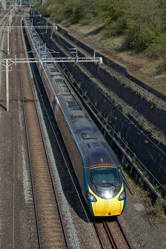 390157, VT 09.20 Manchester Picadilly-London Euston (1A07, 5L), Roade cutting 
 Last in the class 390157 'Chad Varah' passes through Roade cutting on the up slow line following its diversion through Northampton. The 1A07 09.20 Manchester to Euston was the last southbound diverted train before things reverted to normal following the closure of the Weedon route over the previous night. 
 Keywords: 390157 09.20 Manchester Picadilly-London Euston 1A07 Roade cutting Avanti West Coast Pendolino Chad Varah