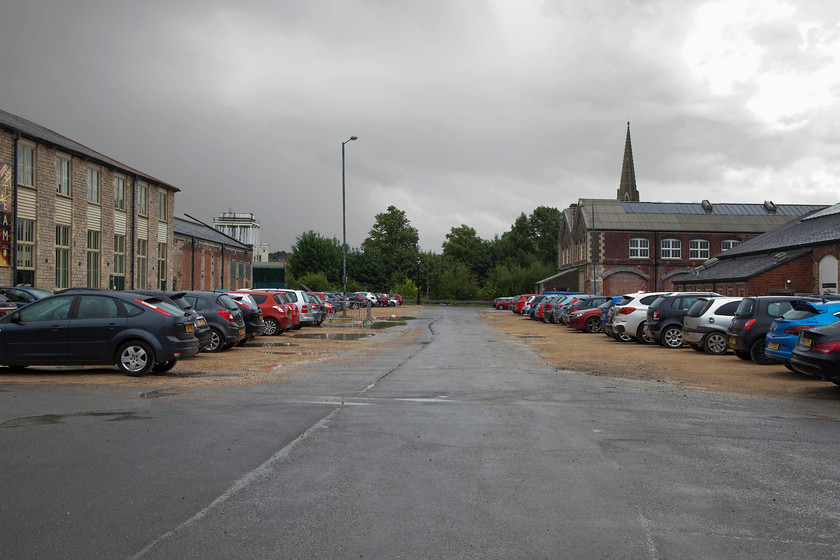 Exterior, Swindon Outlet Village & Steam Museum 
 There was once a traverser in the immediate foreground. This linked the foundry or J shop to the right that is now home to the outlet village to the R or new engine shop to the left. The building to the left is now the home to the Swindon Steam museum. 
 Keywords: Exterior, Swindon Outlet Village & Steam Museum