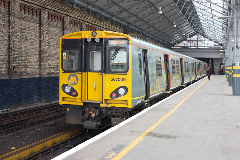 507009, MR 14.58 Southport-Hunts Cross (2U38), Southport station 
 Our train back to Liverpool waits at Southport's platform one. 507009 will work the 14.58 to Hunt's Cross that my wife son and I took as far as Liverpool Central. 
 Keywords: 507009 14.58 Southport-Hunt's Cross 2U38 Southport station