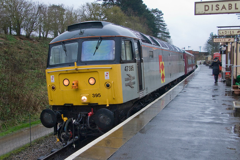 47205, running as 47395, 12.00 Pitsford & Brampton return, Pitsford & Brampton station 
 2014 New Year's Day is pretty poor with miserable weather but at least we have got out! 47205 stands at Pitsford and Brampton station having worked the 11.00 return 'Mince Pie (and sherry!) Special'. 47205 is the railway's mainstay diesel locomotive with long term resident 31289 currently out of service and receiving some much-needed restoration work. As 205 it was withdrawn by Freightliner in late 2001 entering preservation in 2004. The NLR run the loco. as 47395 at this end as BR renumbered it as this from March 1994 until July 1995 during its time as a Channel Tunnel DEAT pool locomotive adapted for multiple working identified by the ugly jumper connection in the centre of the headcode plate. 
 Keywords: 47205 47395 12.00 Pitsford & Brampton return Pitsford & Brampton station