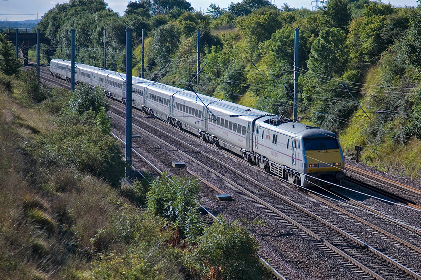 91102, GR 08.30 London King's Cross-Edinburgh Waverley (1S08), Essendine TF042129 
 91102 'City of York' sweeps northwards past Essendine working the 08.30 King's Cross to Edinburgh East Coast service. It is remarkable to think that I first visited this spot in 1979 camping the night with Graham. Then we had the soundtrack of Deltics to keep us company. 
 Keywords: 91102 08.30 London King's Cross-Edinburgh Waverley 1S08 Essendine TF042129 East Coast City of York