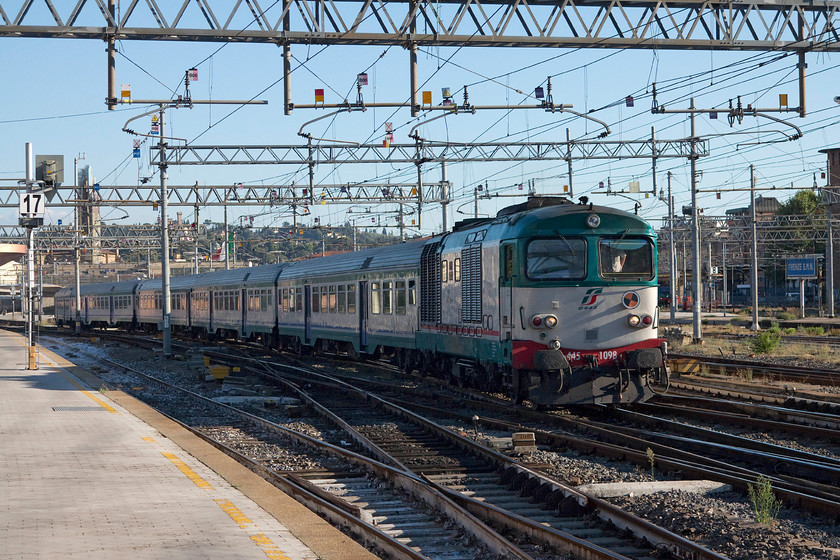 445.1098, 17.55 Florence SMN-Borgo SL (11993), Florence SMN station 
 There are 150 of these 445 diesels in service on the Italian network. They are relatively slow with a maximum speed of 81mph attained from their 1 900Hp Fiat supercharged engines. However, probably due to that supercharger, they make a great noise as this one was as it leaves Florence SMN station with the 17.55 to Borgo San Lorenzo that is about twenty kilometres north east of Florence. 
 Keywords: 445.1098 17.55 Florence SMN-Borgo SL 11993 Florence SMN station