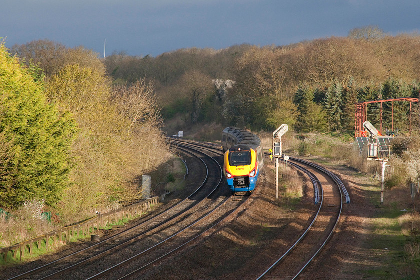 222003, EM 06.21 Derby-London St. Pancras (1C12, 6L), Sharnbrook Junction Tl002598 
 Under a dramatic sky 222003 'Tornado' comes down the bank towards Sharnbrook Junction working the 06.21 Derby to London St. Pancras. Even through Andy and I were in the morning sun, the huge bank of cloud was approaching fast from the north west. 
 Keywords: 222003 1C12 Sharnbrook Junction Tl002598