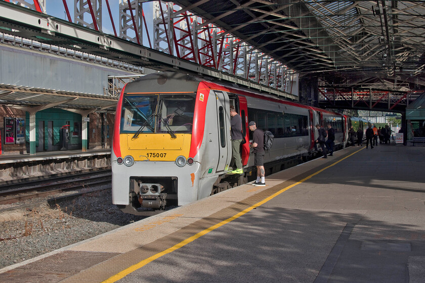 175007 & 175115, AW 06.41 Llandudno-Manchester Airport (1H82, 4E), Chester station 
 Catching some early morning sunlight at Chester station 175007 and 175115 pauses working the TfW 1H82 06.41 Llandudno to Manchester Airport service. I was very surprised at how quiet Chester station was in the twenty minutes or so that I was there between 07.40 and 08.00. I still am firmly of the opinion that the 'COVID effect' is still having a massive impact on how the railways are operating with the leisure times (off-peak) being a lot busier than they used to be replacing the old peak-time period. 
 Keywords: 175007 175115 06.41 Llandudno-Manchester Airport 1H82 Chester station TfW Transport for Wales