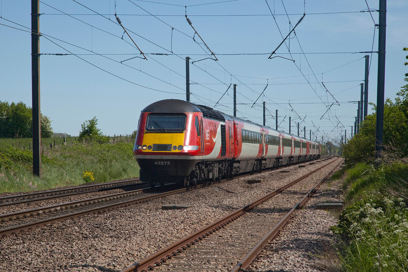 43272, GR 13.06 London King`s Cross-York (1N85, RT), Barnby Lane SK850495 
 Doing what it has done for many years and having amassed hundreds of thousands of miles in doing so, 43272 leads the 13.06 King's Cross to York HST, seen passing Claypole's Barnby Lane level crossing. This iconic train, one that has become so familiar to enthusiasts and the traveling public alike, is in the final few months of operation as withdrawal beckons with Azumas entering revenue earning service the day after this photograph was taken, as a train announcer would put it, 'all change please, all change'! 
 Keywords: 43272 13.06 London King`s Cross-York 1N85 Barnby Lane SK850495