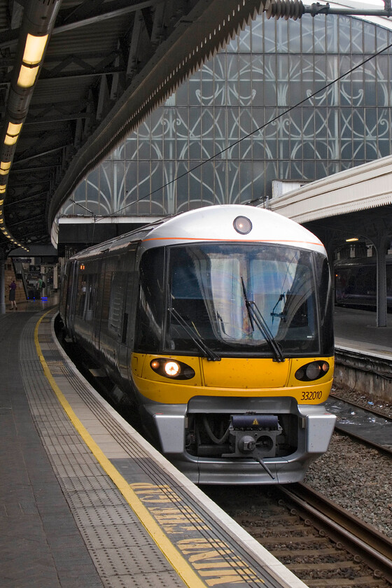 332010, HX 13.25 London Paddington-Heathrow T5, London Paddington station 
 There are fourteen CAF-built Class 332s operated by Heathrow Express. They are impressive-looking units with their huge wrap-around front screens (not all of which are actually glass) and their smooth lines. 332010 waits at Paddington to work the 13.25 service to Heathrow Terminal 5. While extremely convenient and quick, Heathrow Express services are extremely expensive but I suppose that you 'pays your money and makes your choice'! 
 Keywords: 332010 13.25 London Paddington-Heathrow T5 London Paddington station