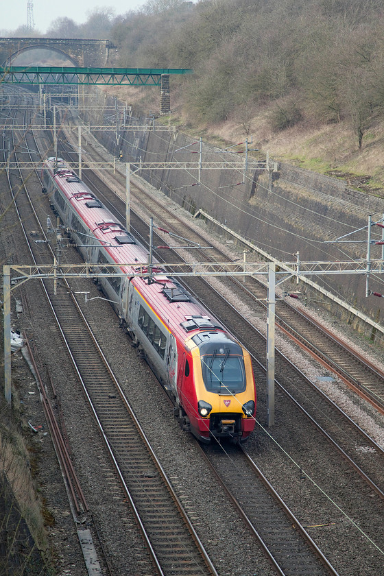 Class 221, 13.40 Birmingham New Street-London Euston (1B24), Roade Cutting 
 Another unidentified Class 221 heads south through Roade Cutting powering the 13.40 Birmingham Euston to London Euston. Virgin must have been very short of electric power on this particular day as this service should have been a Pendolino and was the third diesel-powered train I observed in the short time that I was at Roade Cutting. 
 Keywords: Class 221 13.40 Birmingham New Street-London Euston 1B24 Roade Cutting