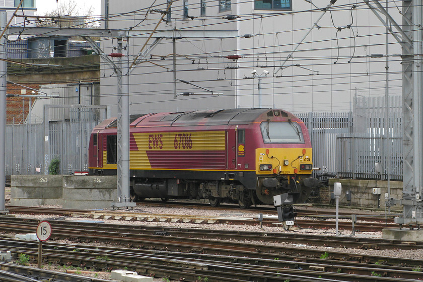 67016, stabled, London King`s Cross station 
 As the station 'Thunderbird' 67016 sits idle at London King's Cross station in front of the power signal box. The 67 is ready for action if and one of the many trains that comes in and out of King`s Cross fails and requires urgent recovery to keep the lines running. 
 Keywords: 67016 London King`s Cross station