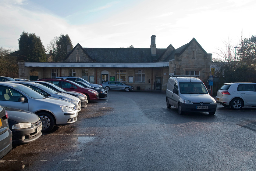 Frontage, Kemble station 
 Kemble station constructed from lovely, warm Cotswold stone has changed little over the years and still manages to retain many of its original features. One feature that is not original are the many cars now left by its commuters and my lovely Combo van seen here stage left!