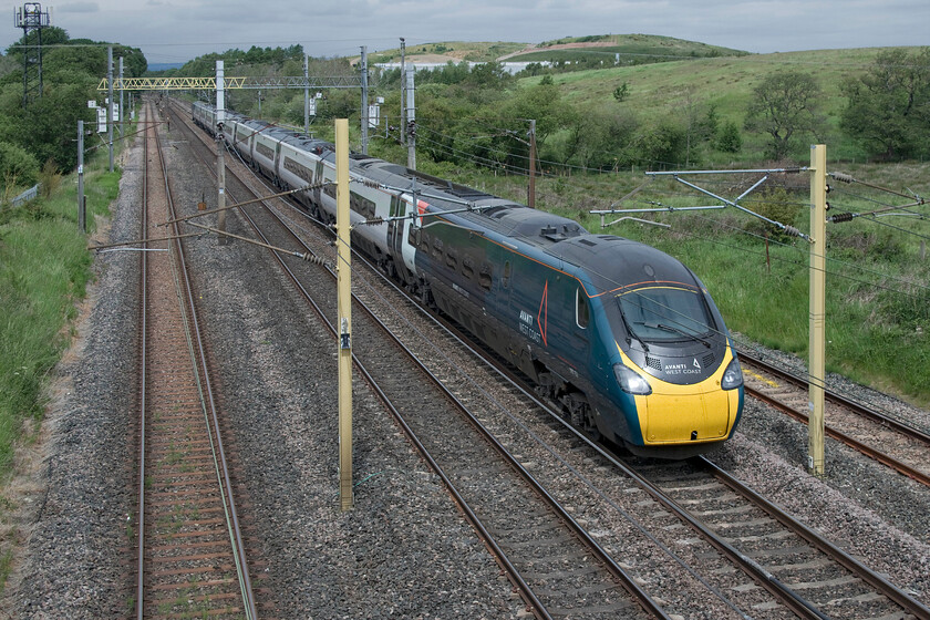 390152, VT 11.33 Glasgow Central-London Euston (Cancelled from Rugby) (1M12, 3E), Blackrigg bridge NY364624 
 With the sun just managing to put in a most welcome appearance at Blackrigg bridge between Carlisle and Gretna 390152 is seen working the 11.33 Glasgow Central to Euston train. The 1M12 Avanti West Coast service did not make it to London being cancelled from Rugby due to signalling issues further south. 
 Keywords: 390152 11.33 Glasgow Central-London Euston Cancelled from Rugby 1M12 Blackrigg bridge NY364624 Avanti West Coast Pendolino