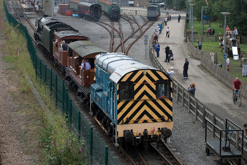 60103 & 08911, demonstration train, Shildon 
 089911 'Matey' is being towed at the back of a short train composed of two brake vans. At the front is 60103 'Flying Scotsman' that was in-steam and was attracting the interest of many visitors. The scene is photographed at the National Railway Museum's Shildon outpost, dubbed 'Locomotion'. 
 Keywords: 60103 08911 demonstration train Shildon