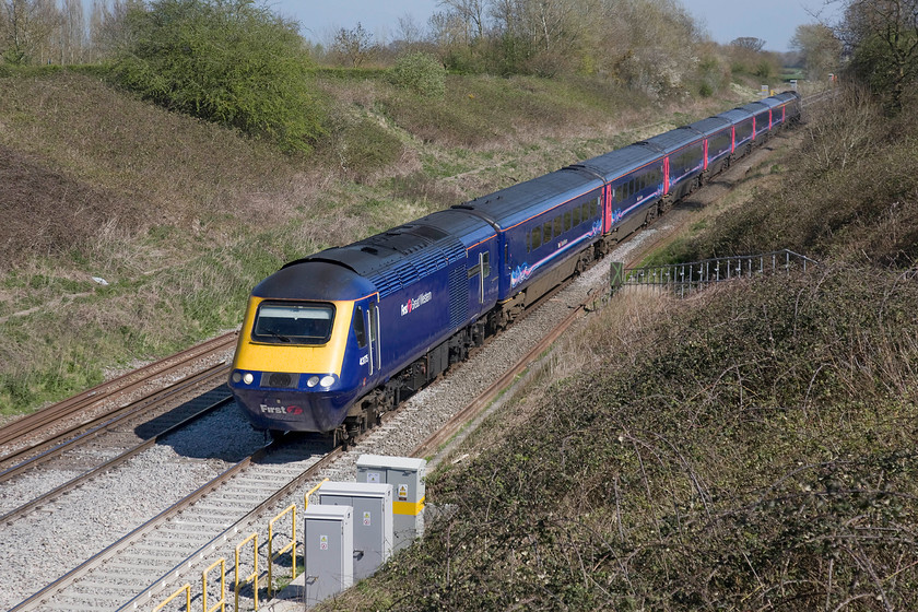 43175, GW 13.15 London Paddington-Cardiff Central (1B37), Baulking 
 43175 'GWR 175th Anniversary' heads west leading the 13.15 Paddington to Cardiff Central. A uniform set of stock in an hst formation looks good in the spring sunshine as it pass Baulking approximately halfway between Swindon and Didcot at just over sixty-five miles from London. 
 Keywords: 43175 13.15 London Paddington-Cardiff Central 1B37 Baulking GWR 175th Anniversary