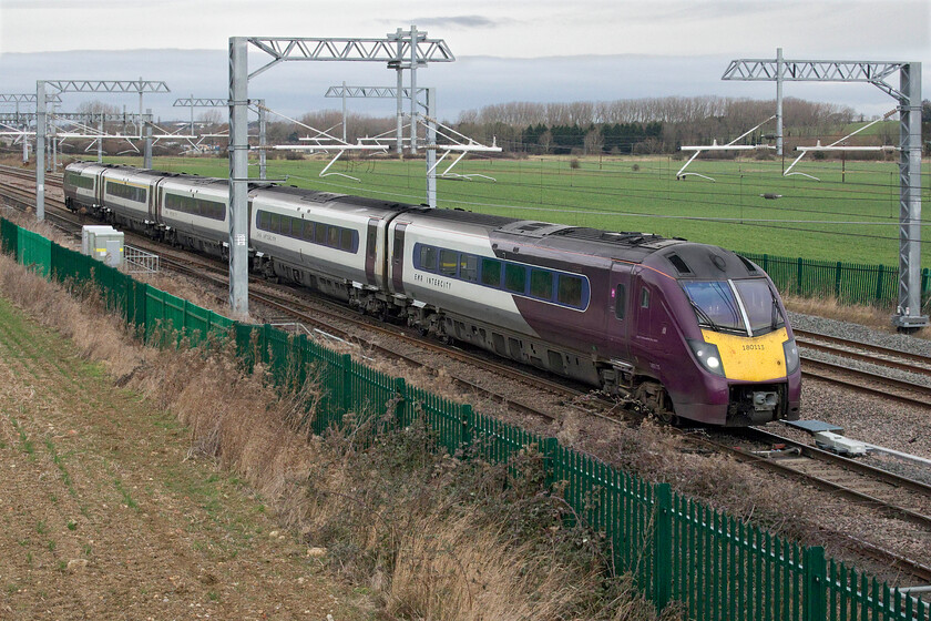 180113, EM 13.12 Nottingham-London St. Pancras (1B52, 1L), Harrowden Junction 
 The four Class 180s that East Midlands took on during 2020 replacing the then imminent withdrawal of the HSTs will only have a limited life on the MML moving on again (unless storage or even withdrawal looms) during next year when the Class 810 bi-modes are introduced. 180113 works the 13.12 Nottingham to St. Pancras service past Harrowden Junction striking quite a pose compared to the more mundane Class 222 Meridians. 
 Keywords: 180113 13.12 Nottingham-London St. Pancras 1B52 Harrowden Junction EMR East Midlands Railways Class 180 Adelante