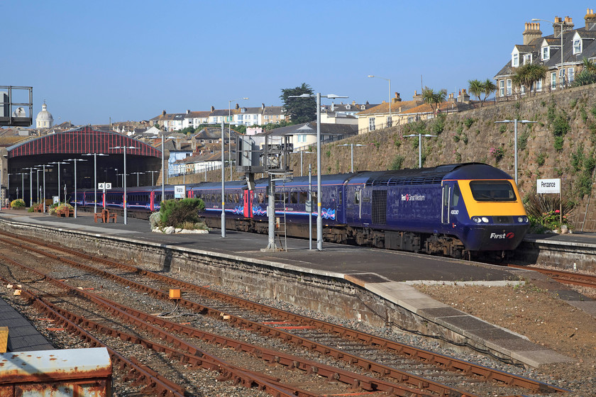 43030, GW 08.44 Penzance-London Paddington (1A81, 27L), Penzance station 
 43030 'Christian Lewis Trust' leads the 1A81 08.44 Penzance to London Paddington HST working waiting to leave the Cornish town. 43030 was an early Western Region power car that was part of 253015 that must have done this amazing journey thousands of times in its forty year career. 
 Keywords: 43030 1A81 Penzance station