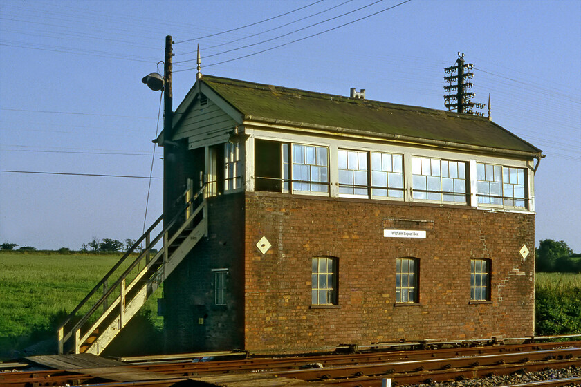 Witham signal box (GW, date NK) 
 With a friendly signalman on-duty Graham and I were afforded pretty much-unrestricted access around the environs of Witham (Somerset) signal box as long as we stayed well away from the running lines. It was located on the southern side of the tracks between Frome and Bruton at the point where the branch to Merehead quarry left line. I have precious little information about the box but from its non-hipped roof and brick base, I would suggest that it is Type 12 dating from wartime when this simpler and cheaper design was adopted...advice anybody, please. 
 Keywords: Witham signal box GWR