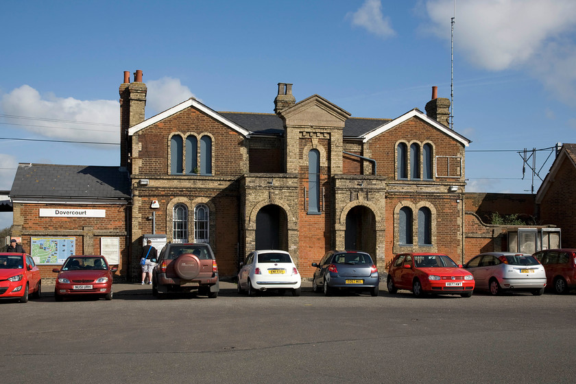 Frontage, Dovercourt station 
 The Eastern Union Railway opened Dovercourt station 15.08.1854 to serve the seaside resort of the same name. Notice the building's pleasant symmetry making it appealing to the eye. The rather grand and attractive station building is now unceremoniously boarded up and unused; what a waste. 
 Keywords: Frontage Dovercourt station