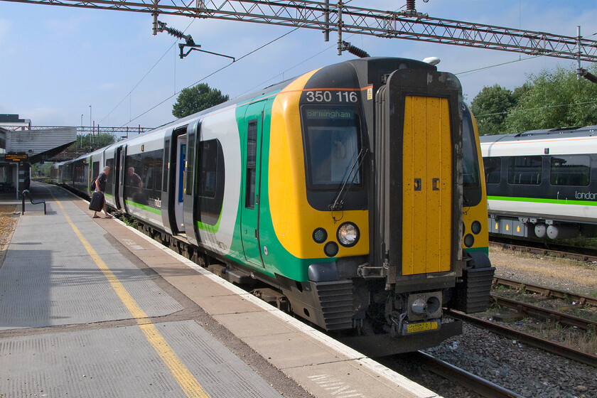 350116, LM 08.49 London Euston-Birmingham New Street (1W05), Northampton station 
 The first train of my two-part journey to Lichfield waits at Northampton station having arrived from London. I took 350116 working the 08.49 Euston to Birmingham New Street as far as Rugby, a distance of nineteen miles. 
 Keywords: 350116 08.49 London Euston-Birmingham New Street 1W05 Northampton station London Midland Desiro