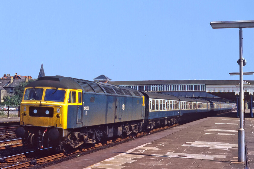 47366, 08.25 Leamington Spa-Llandudno ADEX (From BNS) (1ZXX), Rhyl station 
 On this summer Sunday back in 1981 Graham and I had no idea what this train, hauled by Crewe diesel's no heat 47366, was as there was nothing in the working timetable at this time of day that fitted its description. Only some forty years later have I discovered by the wonders of the internet that it was actually an ADEX (Away Day EXcursion) that had originated at Leamington Spa and that was heading towards Llandudno. According to the notes on the web the Class 47 took over at Birmingham New Street but I have no reporting number unless anybody knows better? The train is seen not far from its destination passing through Rhyl station. 
 Keywords: 47366 08.25 Leamington Spa-Llandudno ADEX 1ZXX Rhyl station