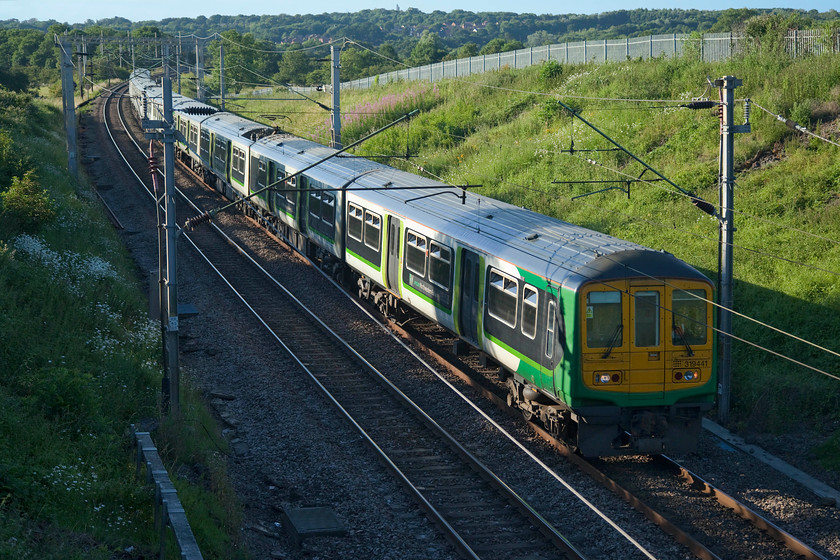 319441, 319214 & 319219, LN 19.14 Northampton-Bletcheley CS ECS (5B51), Milton Malsor SP738560 
 Having just worked down to Northampton as a commuter working, the trio of class 319s composed 319441, 319214 and 319219 return to Bletchley carriage sidings as the 5B51. The ECS working is seen approaching Milton Malsor just south of Northampton. It is likely that these old units, dating from the late 1980s, will be handed back to their owner soon as new stock is introduced to the London Northwestern network. 
 Keywords: 319441 319214 319219 19.14 Northampton-Bletcheley CS ECS 5B51 Milton Malsor SP738560